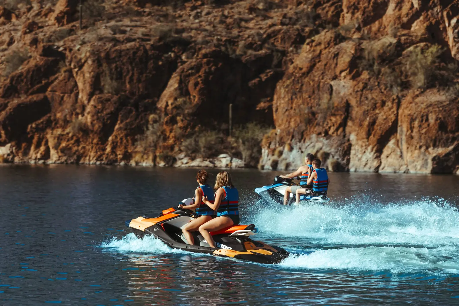 Sea-Doo Spark 3up jet ski on calm Saguaro Lake with Sonoran Desert scenery and canyon walls in background